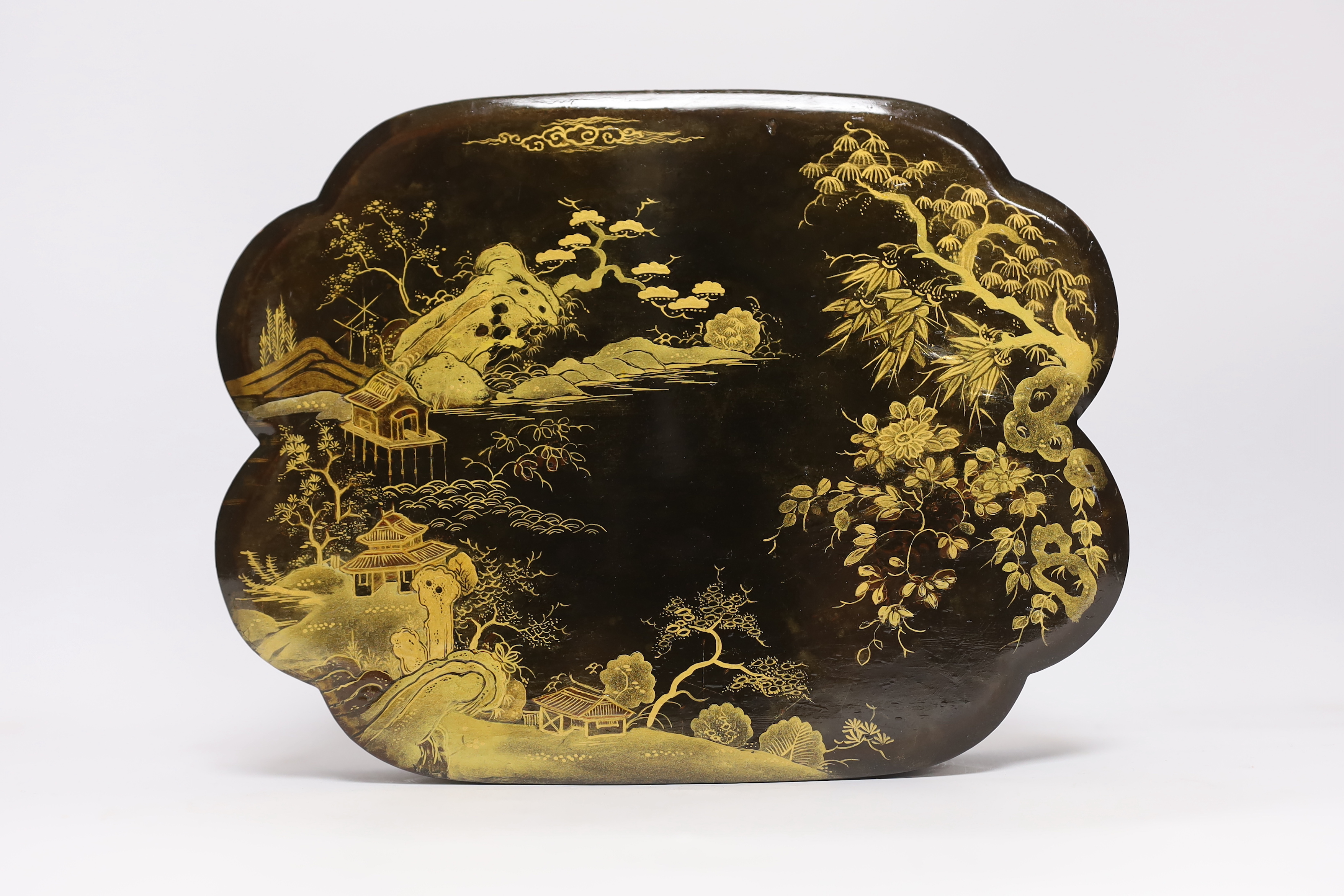An early 20th century Japanese gilt lacquer box containing nine similar boxes, 28cm